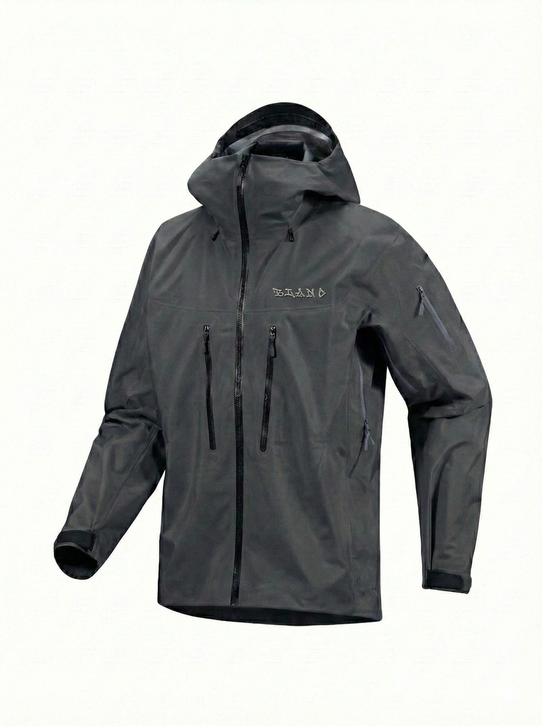 Grey technical shell with a hood and chest mounted pockets on a white background.