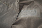 Close-up of the seam taping on a snow shell.